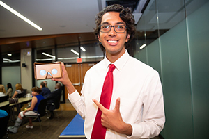 Summer Research student participant showing research tool