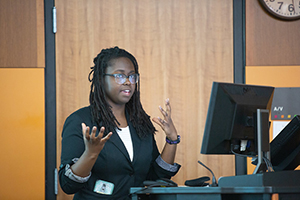 undergrad summer research program student giving lecture