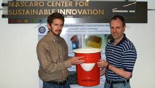 ceramic water filter project coordinators showing sample filter